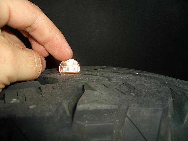 Tires are a few years old but have a lot of tread left.  Right-rear tire