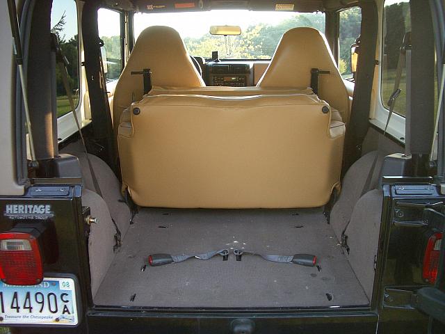 Rear seat folds up