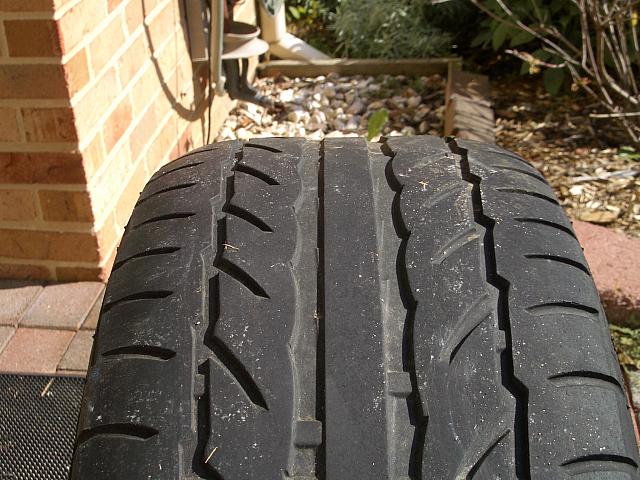 Wheel & Tire #4:  Was in the front for 12,000 miles.  Tread depth is .120-.140"