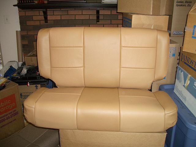 The rear bench.  I was dissapointed in the leather to vinyl ratio.  Usually the entire top side of seats is leather.  This skin 