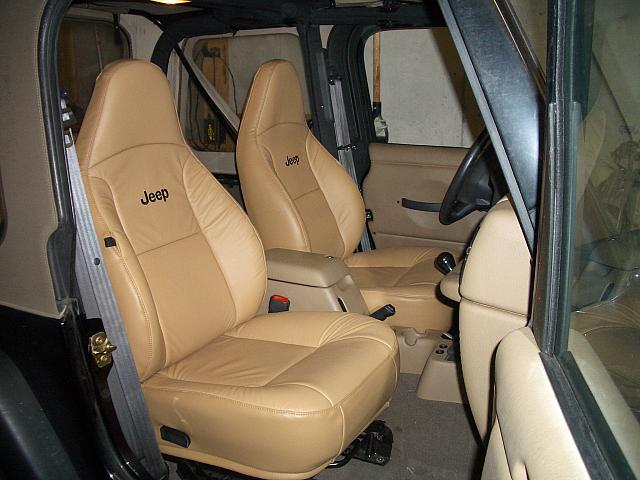 Installed in the jeep.  The leather was "doeskin" color.  Looks like Camel might have matched better but this still lo