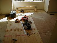 We ripped up all of the linoleum and began to add another layer of subfloor.