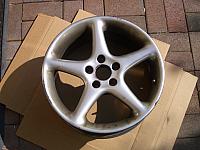 Wheel 4.  This one came of of the car early in the summer.  Has a mild bend and should be repairable.  Decent finish.